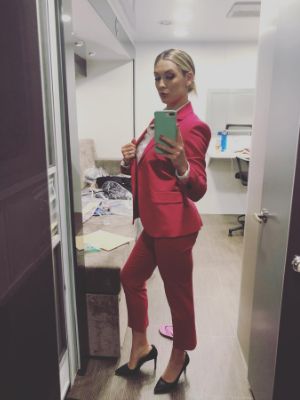Briga Heelan posing for a full figure mirror selfie 